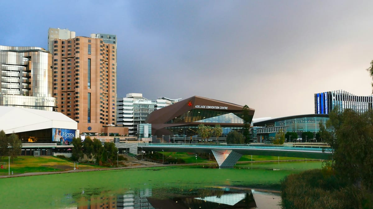Adelaide skyline reflected in the river Torrens