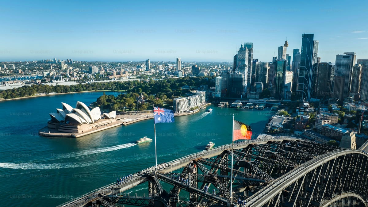 Aerial view of an Australian city harbour and CBD